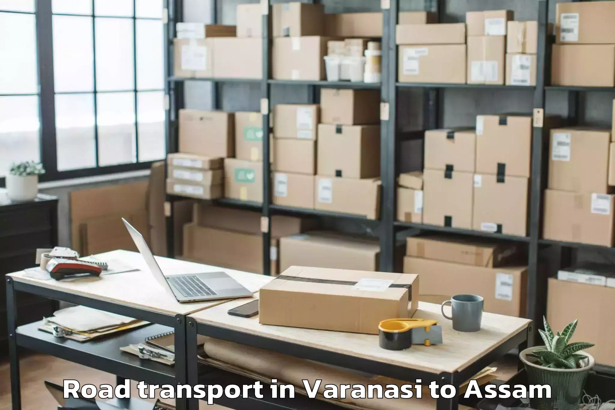 Varanasi to Lakhipur Road Transport Booking